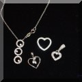 J03. White gold and diamond pendants. 